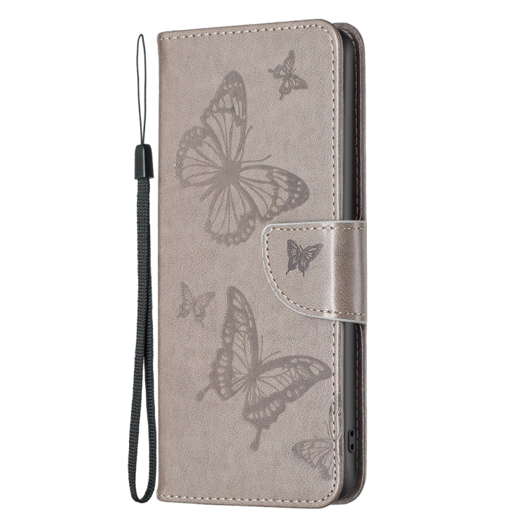 For iPhone 16 Pro Embossing Two Butterflies Pattern Leather Phone Case(Grey) - iPhone 16 Pro Cases by PMC TechLife | Online Shopping South Africa | PMC TechLife | Buy Now Pay Later Mobicred