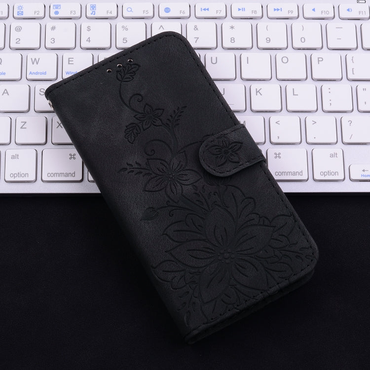 For iPhone 16e Lily Embossed Leather Phone Case(Black) - iPhone 16e Cases by PMC TechLife | Online Shopping South Africa | PMC TechLife | Buy Now Pay Later Mobicred