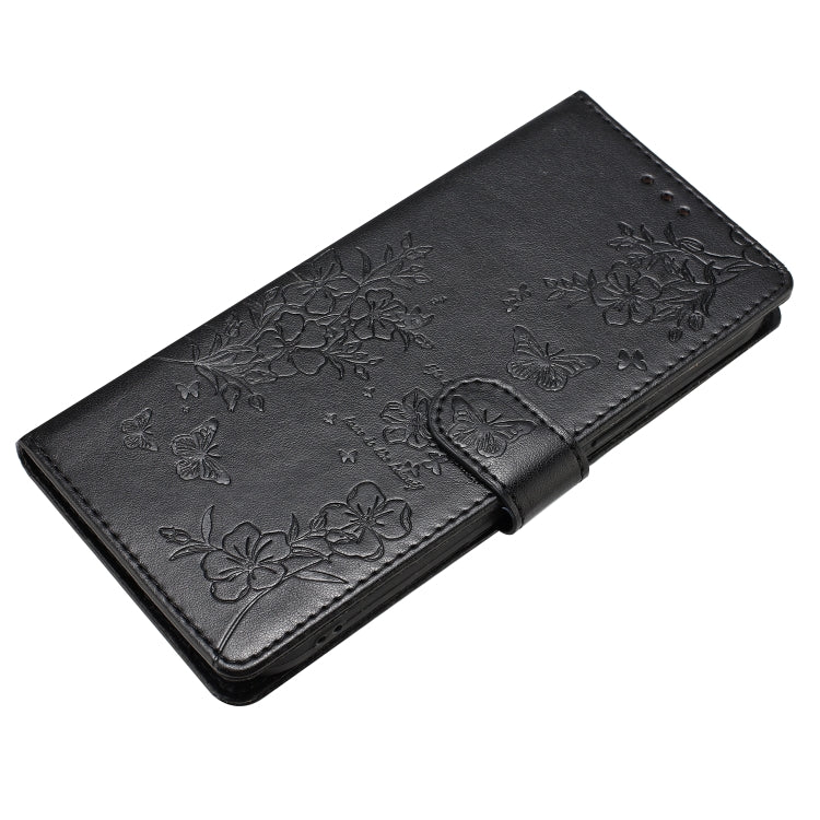 For iPhone 16 Butterflies and Flowers Leather Phone Case(Black) - iPhone 16 Cases by PMC TechLife | Online Shopping South Africa | PMC TechLife | Buy Now Pay Later Mobicred
