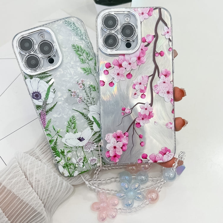 For iPhone 16e Electroplating Flowers Plants Texture Wristband TPU Phone Case(Wildflower FL2) - iPhone 16e Cases by PMC TechLife | Online Shopping South Africa | PMC TechLife | Buy Now Pay Later Mobicred