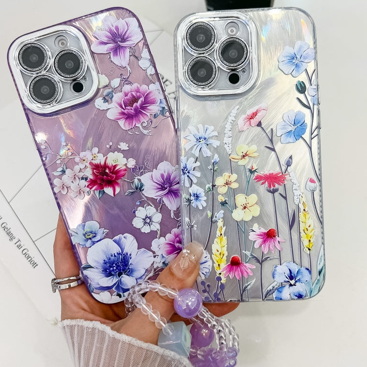 For iPhone 16e Electroplating Flowers Plants Texture Wristband TPU Phone Case(Blue Flower FL13) - iPhone 16e Cases by PMC TechLife | Online Shopping South Africa | PMC TechLife | Buy Now Pay Later Mobicred